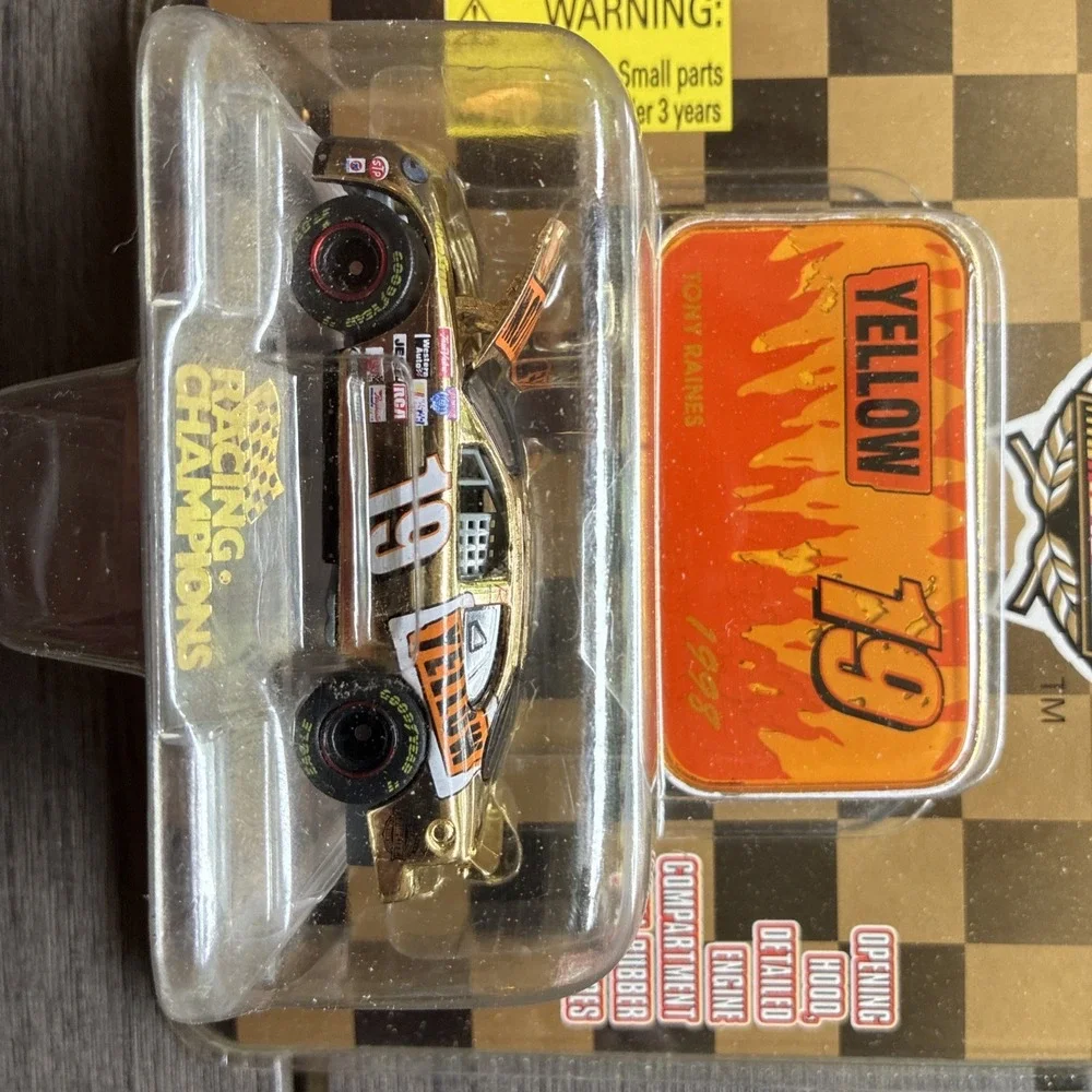 1998 RACING CHAMPIONS-NASCAR Gold 1/64 #19 Tony Raines 